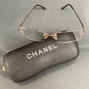 Chanel glasses rose gold in color with black case
